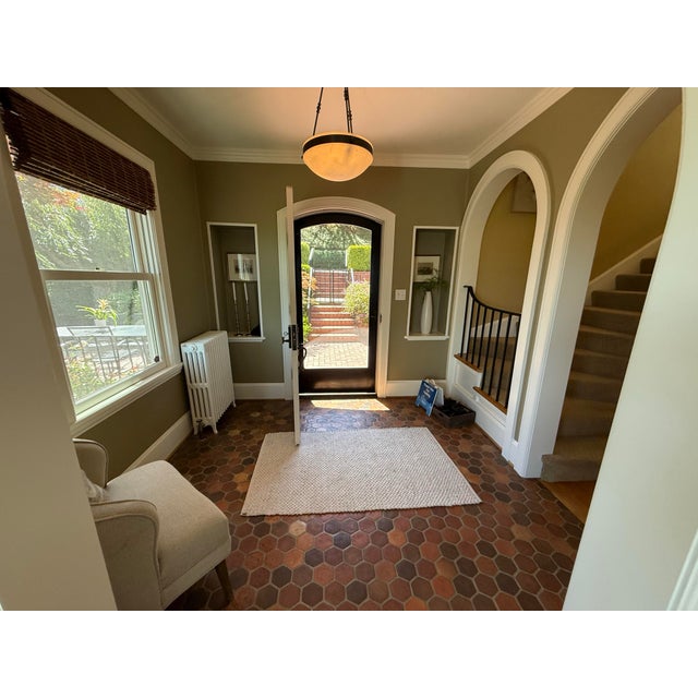 A stunning vintage pendant light featuring an alabaster bowl shade with a warm, luminous glow. Made in Spain — confirmed...