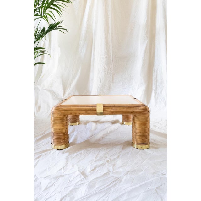 Bamboo and Brass Coffee Table with Ivory-Colored Top – 1970s Structure covered in curved bamboo canes with ivory-colored...