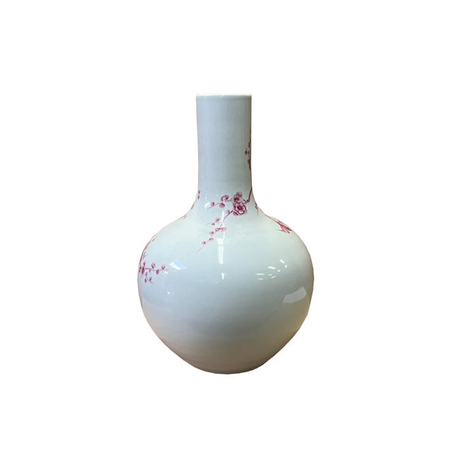 This is a Chinese decorative porcelain vase in plum red #69313f flower bird and white base color finish. Dimensions: Dia...
