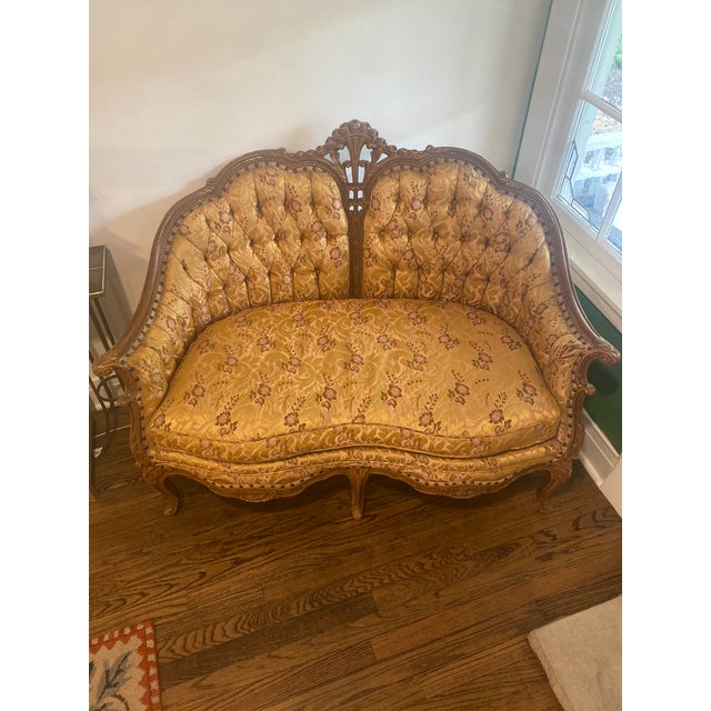 Stunner. The condition is incredible. Rare Carved Wood - Custom Loveseat. Beautiful yellow and pink palette. Homer...