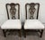 This is a gorgeous pair of vintage Chippendale style mahogany dining chairs with Georgian influence. Features elegant...