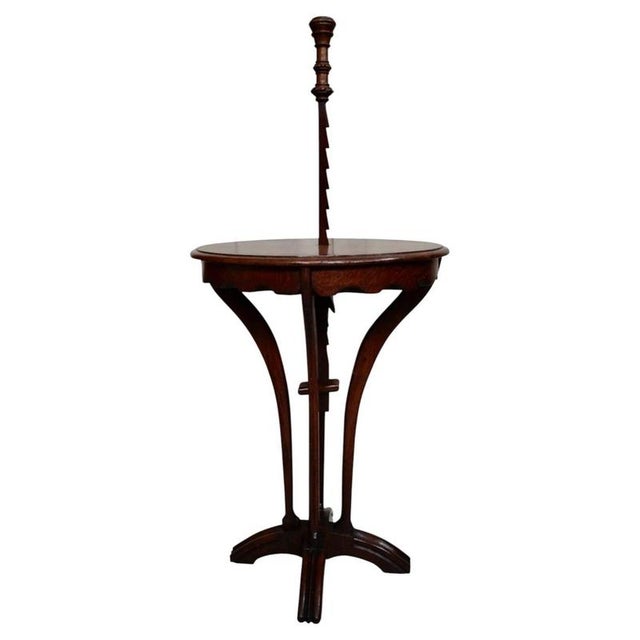 A rare early 19th-century adjustable ratchet candle stand table dating to circa 1820, constructed from oak. The design...