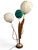 Exceptional Mid-Century Modern sculptural table lamp featuring three original spun acrylic “spaghetti” globe shades in...