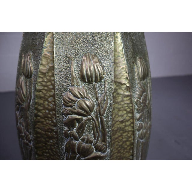 Highly decorative brass & copper Art Nouveau umbrella stand. This entirely handcrafted, early 1900s hall stand is probably...