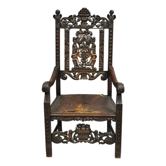 Late 19th Century Antique Italian Renaissance Carved Walnut Throne Armchair With Winged Cherubs For Sale