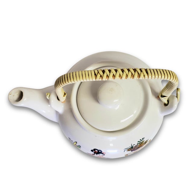 Add a touch of Mid-Century Asian flair to your tea service or kitchen display with this charming Japanese porcelain...