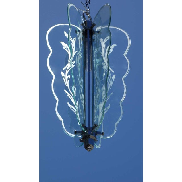 An incredibly unique Art Deco etched glass butterfly chandelier. Newly rewired and ready to install.