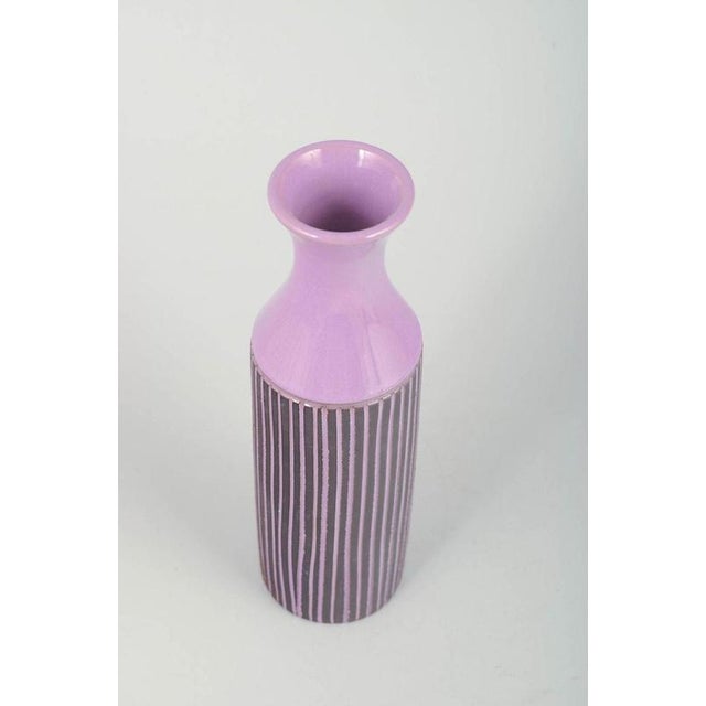 Gabriel, Sweden Ceramic vase, 1970s. Tall cylindrical retro vase in purple glaze with hand-painted vertical striping in...