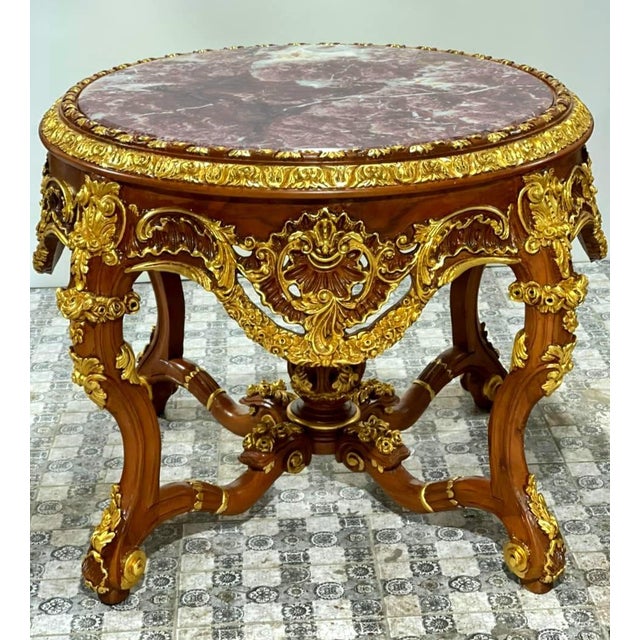 Create a breathtaking focal point in your home with this monumental French Louis XV round table. Masterfully handcrafted...