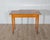 A beautiful late Gustavian game table, circa 1840, crafted in cherry with nutwood inlays, combining refined neoclassical...