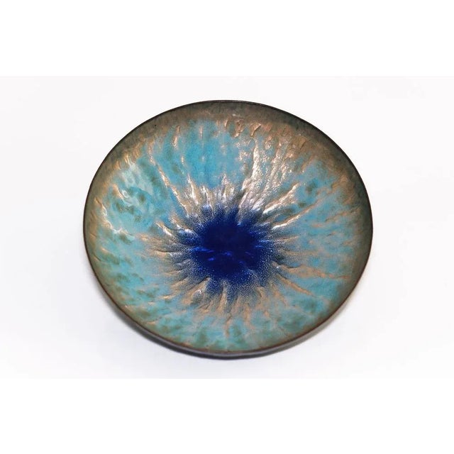 Stunning enamel on copper bowl by Paolo De Poli with a radiating aquamarine and blue interior. Signed on the bottom. This...