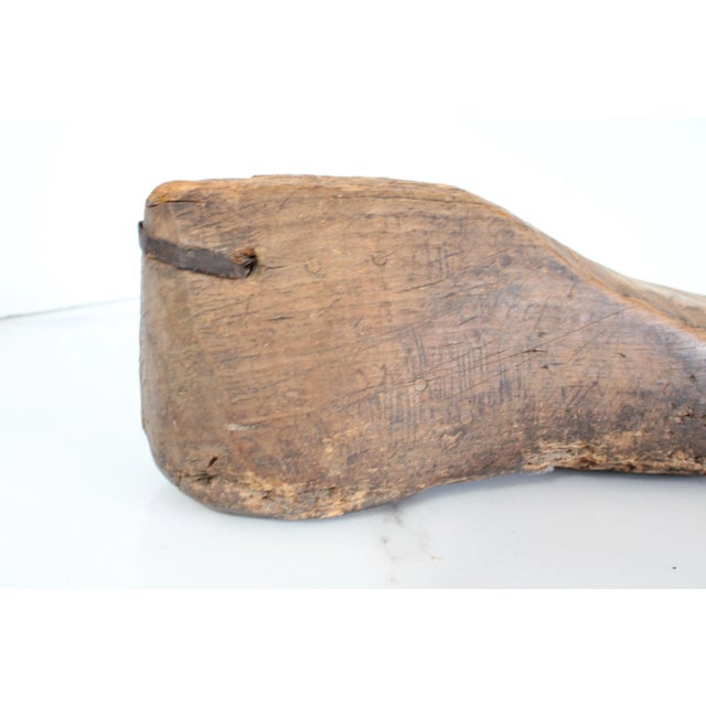 Pair of vintage carved French shoe molds. Smaller child shoe mold size 6.50" Want to explore more products at...