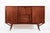 This vintage mid century Danish modern tall teak wood sideboard cabinet or bar cabinet attributed to Harry Ostergaard for...