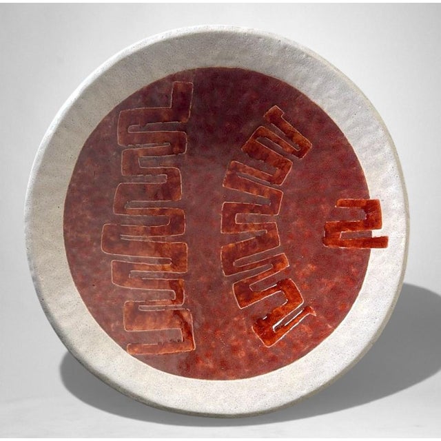 A French centerpiece of distinctive character and artistic interest, crafted in the Brutalist style between 1950 and 1955...