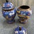 A spectacular and highly collectible find, this listing is for a matching Pair of large Vintage Cloisonné Enamel Lidded...