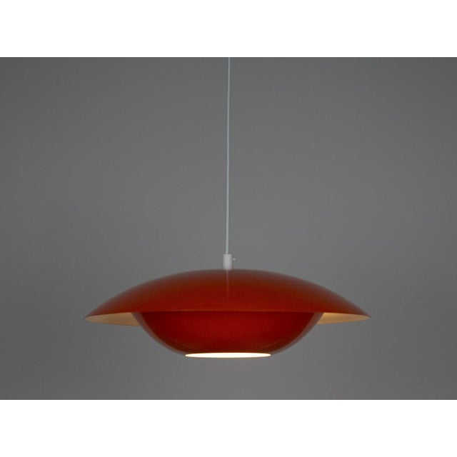 The lamp is made of aluminum. Dimensions: Diameter 40cm Height 20cm The lamp is in very good condition for its age, with...