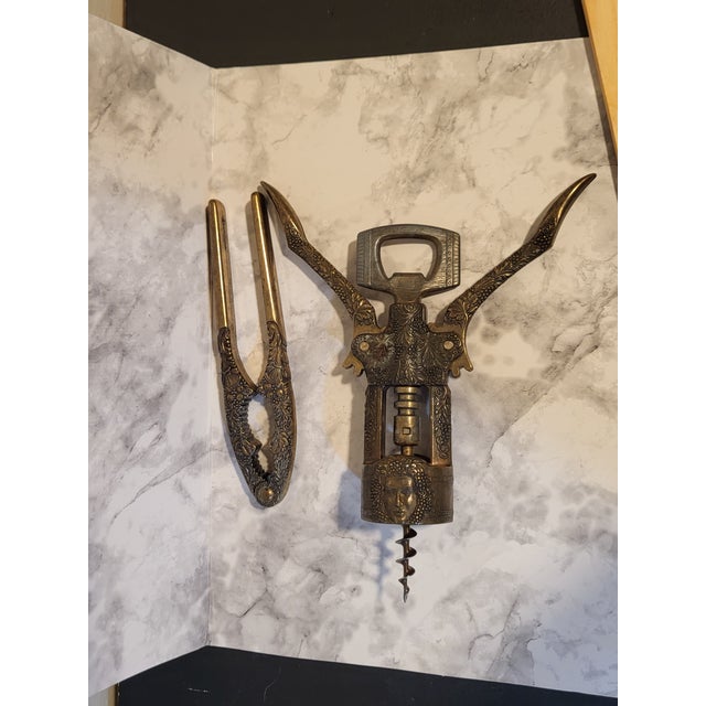Looking for an eye-catching set for your bar or drink station? Here is a solid brass wine bottle opener and nut cracker....