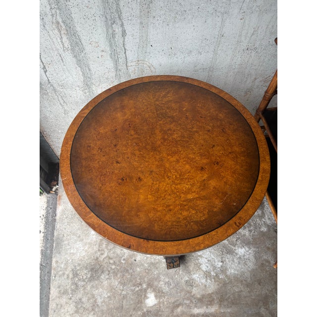 Elegant and richly detailed, this 1930s French Art Deco gueridon table showcases exceptional craftsmanship and...