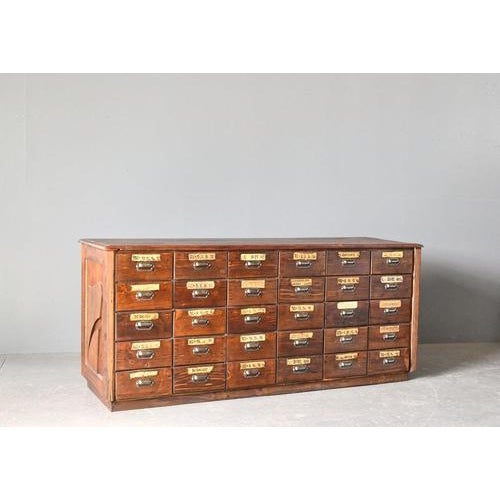 Ironmongers Shop Counter Drawers Circa 1910s - Solid pine and Larch with original cast iron handles - Decorative carved...