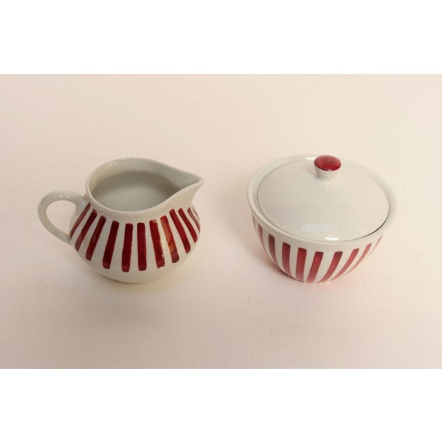 Swedish modern flintporslin/flintware lidded sugar bowl and creamer set from the 1952 "Tea" series by Karin Björquist for...