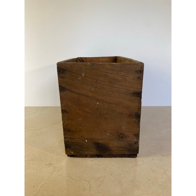 A complete vintage wooden wine shipping crate stamped "WINESHIPPER — S.A. D'Exploitation du Château de Lescours — St...