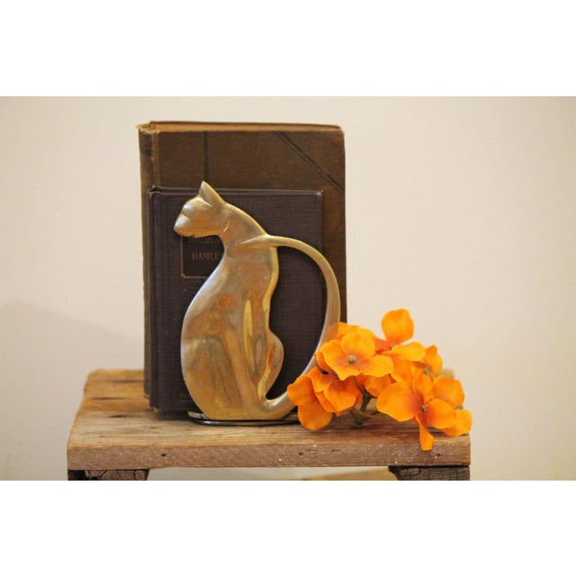 An excellent pair of bookends in brass! These would have been made likely in Asia sometime in the 1960s. They have no...