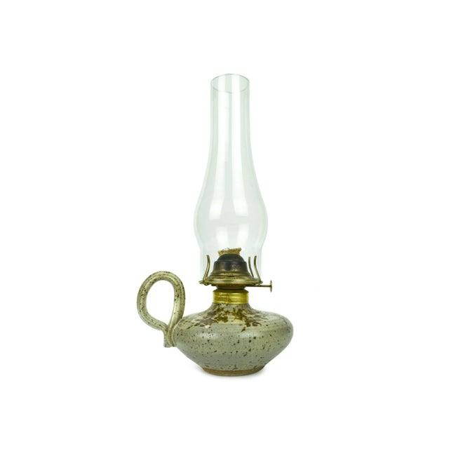 Stunning handmade studio pottery oil lamp with a glass shade and wick. Unique piece to display on coffee table, side...