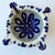 A charming French stoneware mortar decorated in a bold hand-painted blue floral design on a cream ground. Featuring the...