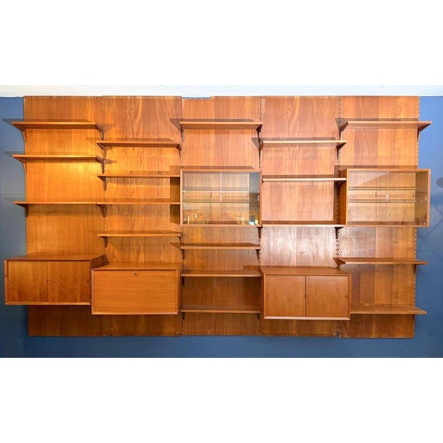 Mid-Century Modern Large Wall Unit by Poul Cadovius for Royal System , 1950s This piece is attributed to the mentioned...