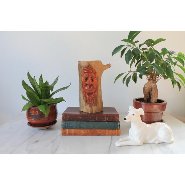 Vintage hand carved wood face sculpture. No makers mark. Some age wear.