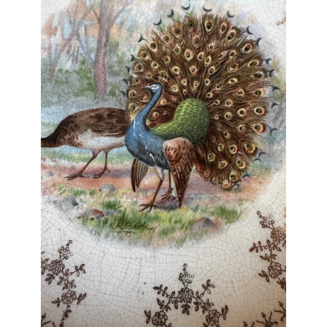 Striking set of six vintage decorative plates by Sterling China, each featuring detailed illustrations of wild game birds...