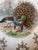 Striking set of six vintage decorative plates by Sterling China, each featuring detailed illustrations of wild game birds...