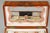 Precious rectangular sewing box in rosewood veneer called. Uncovered, it presents a mirror with braids on the back of the...