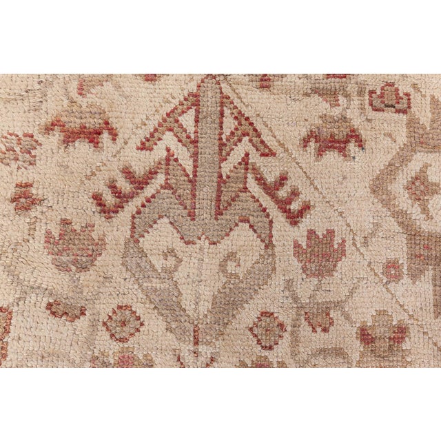 This exquisite antique Turkish Oushak rug dates back to the early 20th century, showcasing the classic hallmarks of Oushak...