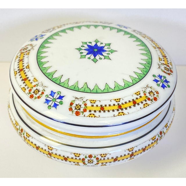 Neoclassical Limoges porcelain handcrafted and hand painted gold trimmed footed trinket/jewelry box or candy dish. Bears...