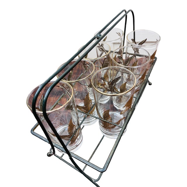 Fabulous find! 8 Libbey highball bar glasses with their original metal carrier. Pattern is golden mallards, artist is...