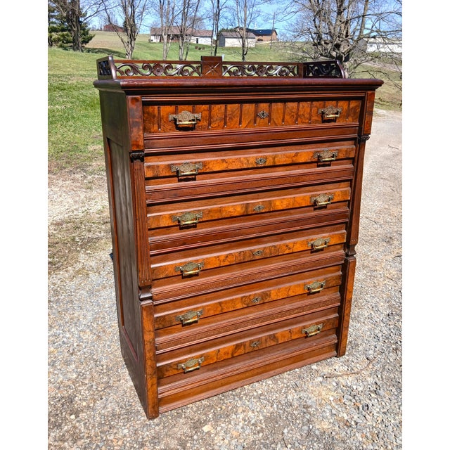 Antique Walnut Eastlake Victorian Chest of Drawers with 6 Drawers 1870s An antique six drawer walnut Eastlake or Victorian...