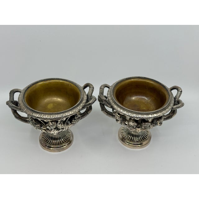 A beautiful crafted late 19th century pair of silver plated bronze neoclassical grand tour souvenirs of the Warwick and...