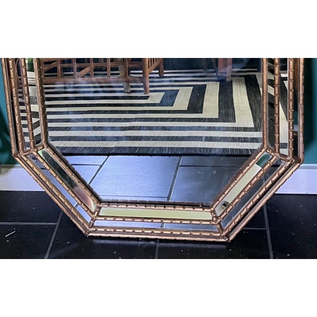 Make a style statement with this stunning, large-scaled Hollywood Regency style gold gilt faux bamboo octagonal facet-...