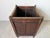 This charming antique French Country wooden wastebasket features a distinctive square tapered silhouette crafted from...