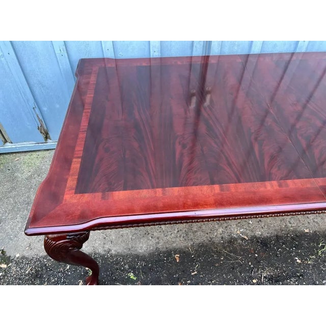 Vintage Chippendale Style Flame Mahogany Extension Dining Table with Leaf. Unmarked but well made with inlays, and flame...