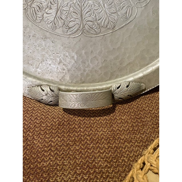 Standout serving tray. 18.5” diameter. 1940s. Decorative metalware. Sculptural leaf handles. Hostessware.