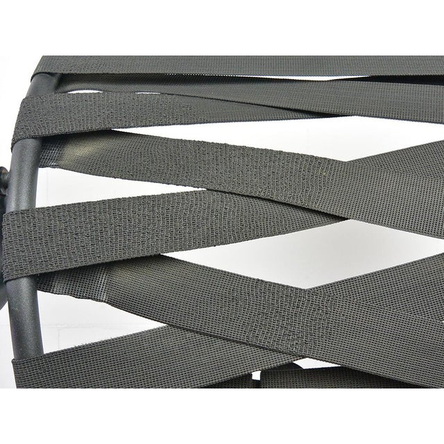 This rare chair designed by Paolo Parigi is in very good original condition. The seat is made of a solid aluminum. The...