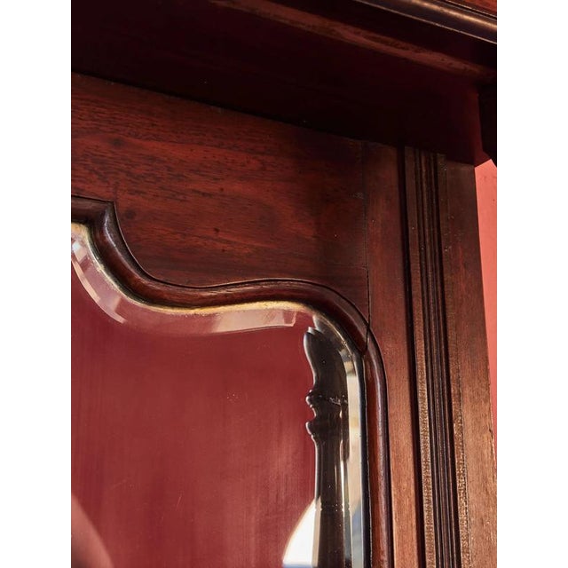 This impressive English sideboard from the turn of the 19th and 20th centuries is made of solid wood and decorated with...
