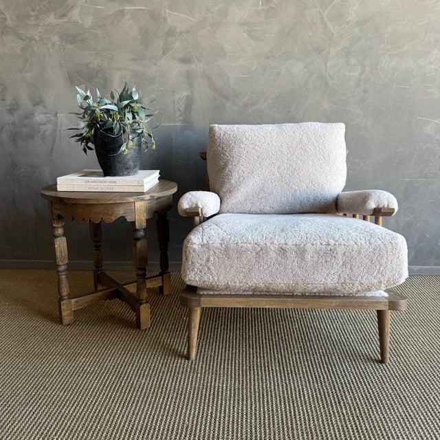 Frances White Oak Chair in Genuine Sheepskin. The seat is a down / feather wrapped foam, in medium firm density, with a...
