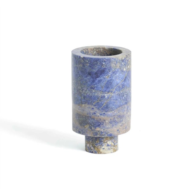 Blue inside out vase by Karen Chekerdjian Dimensions: 8 x 24 cm Materials: Blue Sodalite Karen’s trajectory into designing...