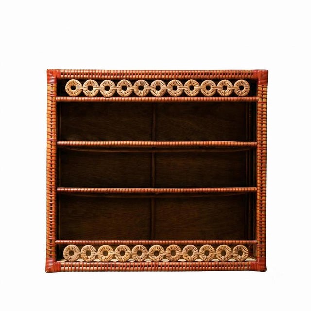 Bridget low cabinet in natural rattan by popus editions. Dimensions: w 110 x d 35 x h 100 cm. Materials: natural stained...