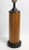 Cool Mid Century Gruvwood table lamp, having a fluted wood column, mounted on black metal base. This example is in very...