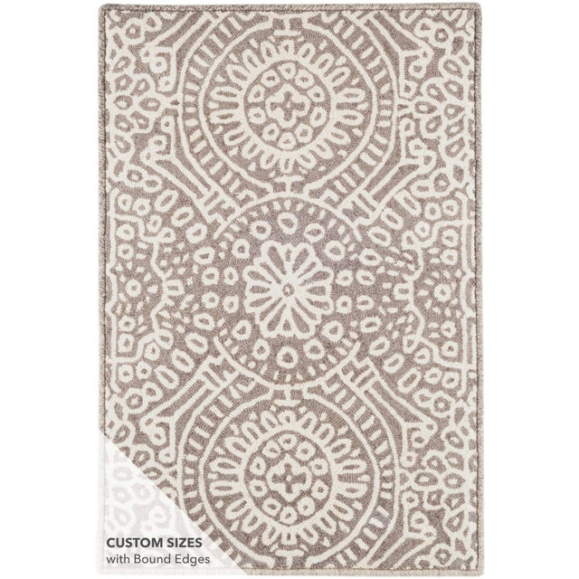 Build a cozy and welcoming sanctuary with this micro-hooked wool rug. Featuring a pattern reminiscent of stained glass on...