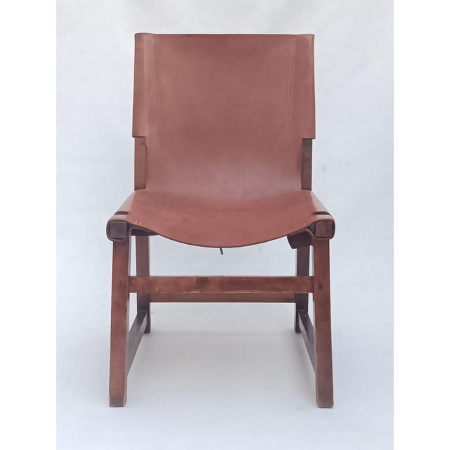 This chair was made in the style of the Riaza S-140 chair made by Paco Muñoz for Darro, Madrid 1958